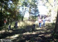 View from the cemetery back towards the church - WVCPA volunteers Arnie & Kitty Severn with Joel Duprey in the photo