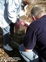 WVCPA volunteer Elouise H. & Joel working on an aluminum foil rubbing at Coleman-Lovejoy Cemetery in Putnam Co.